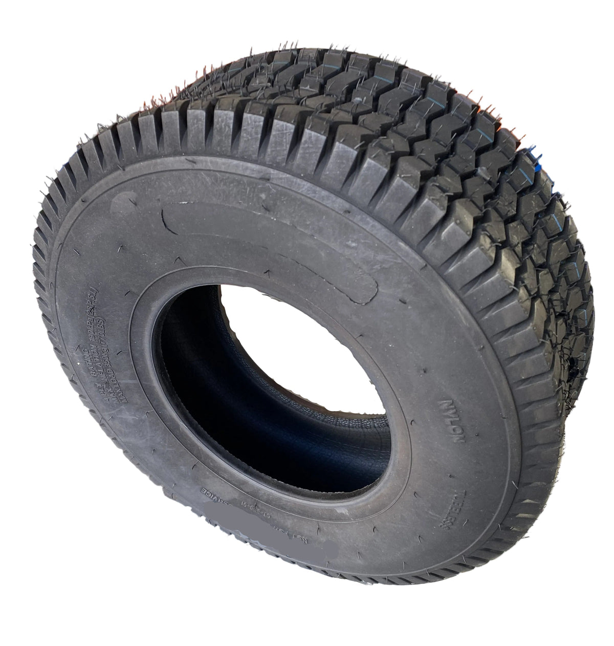 A heavy-duty black tyre with deep treads, 